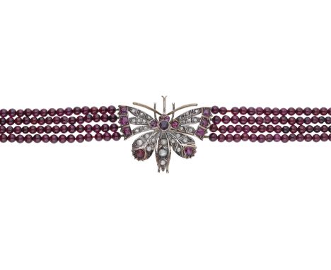 A garnet bead necklace with gem-set butterfly clasp, the four uniform rows of garnet beads to a gold mounted butterfly clasp 