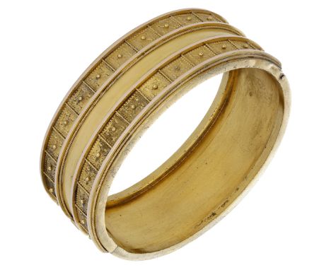 A 19th century archaeological revival hinged gold bangle, with applied granulation and ropetwist decoration to the front, blo