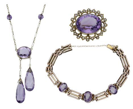 A small collection of early 20th century amethyst jewellery, comprising an amethyst negligee pendant, an amethyst and seed pe