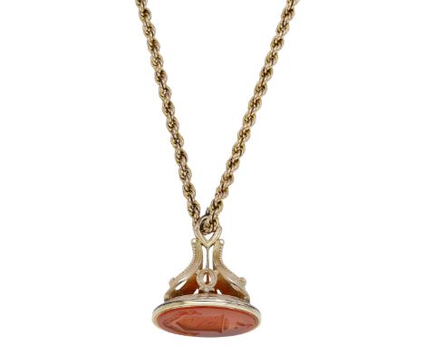 Two 19th century gold mounted carnelian fob seals on chain, the larger panel engraved with a coat of arms, the second smaller