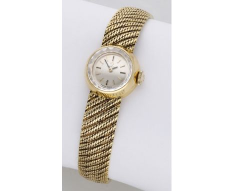 Omega. A lady’s gold bracelet watch, circa 1963. Movement: cal. 483, manual winding, 17 jewels, no. 20185861. Dial: silvered,
