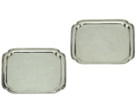 A pair of George V Britannia standard silver salvers, square, with re-entrant corners, by Lionel Alfred Crichton, London 1912