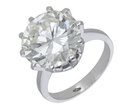 A diamond single stone ring, set with a brilliant-cut diamond, weighing 9.03 carats, to a plain polished band, stamped ‘750’,