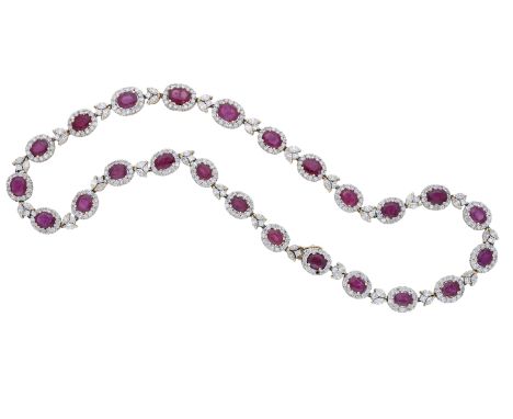 A ruby and diamond cluster necklace, composed of slightly graduating clusters of oval mixed-cut treated rubies, in four claw 