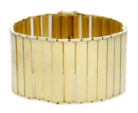 An 18ct gold broad link bracelet, French, composed of articulated polished panel links, French assay marks, indistinct lozeng