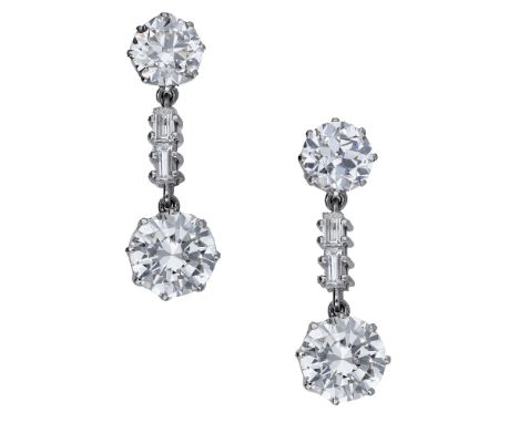 A pair of diamond ear pendants, claw set with brilliant-cut diamond surmounts, weighing 1.73 and 1.87 carats, each suspending