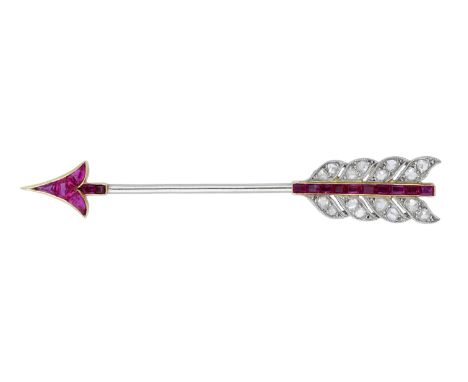 An early 20th century jabot pin, designed as an arrow, set with rose-cut diamonds and calibré-cut synthetic rubies, mounted i