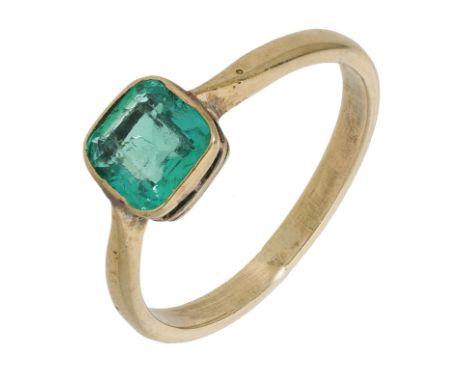 A Colombian emerald single stone ring, the octagonal-cut collet set to a plain polished band, ring size L½.     £500-£700  --