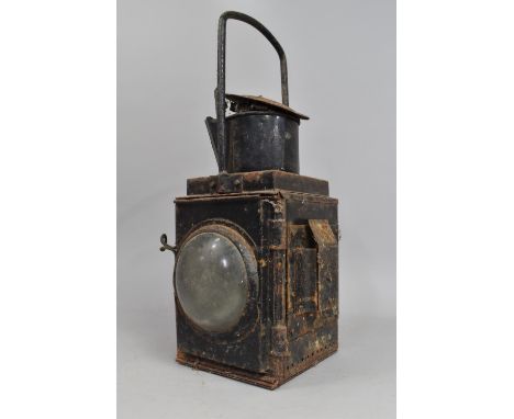 A Vintage Railway Lamp with Bullseye Glass and Complete with Burner, Rusted Condition, 47cm high 