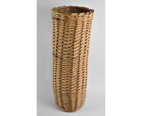 A Cylindrical Wicker Stick Basket, 56cms High 