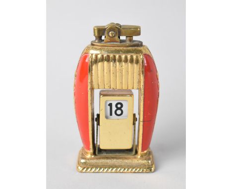 A Mid 20th Century Enamelled Brass Novelty Desk Top Calendar and Lighter with Automatic Date Changing Mechanism, 7.5cms High 