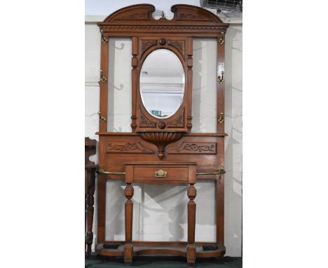 A Late Victorian/Edwardian Hall Stand with Six Brass Hooks, Oval Mirror, Central Glove Drawer, Two Stick Stands, 220cms High 