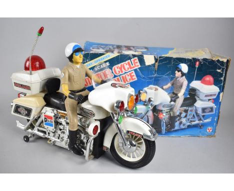 A Vintage Battery Operated Police Motorcycle (Working Order) 