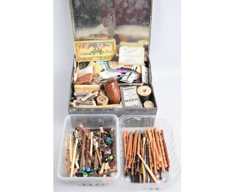 A Tin Containing Various Vintage Sewing Accessories and Items Together with a Collection of Wooden and Plastic Lace Bobbins 