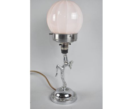 An Art Deco Influenced Chromed Table Lamp, The Supports in the Form of Dancing Nude with Knee Raised, Glass Globular Shade, 3