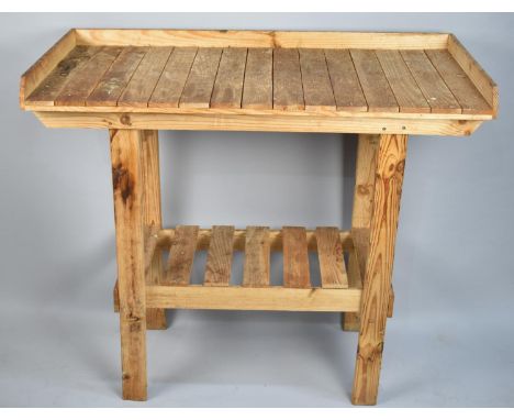 A Pine Planting Stand with Stretcher Shelf, Galleried Top, 107cm wide 