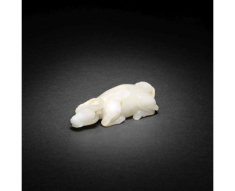 A WHITE JADE CARVING OF AN OX AND BOY17th centuryThe pebble smoothly carved as a recumbent ox with legs tucked underneath the