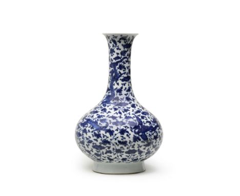 A BLUE AND WHITE 'CHILONG AND PHOENIX' VASELate Qing Dynasty/Republic PeriodSturdily potted with a large globular body suppor