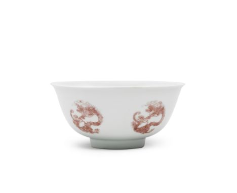 A COPPER-RED 'DRAGON' MEDALLION BOWLKangxi six-character mark and of the periodFinely potted with rounded sides rising from a