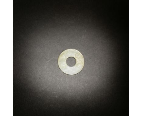 A WHITE JADE DISC, BISong/Ming DynastyExquistely carved on each side with a pair of archaistic chilong clambering sinuously, 