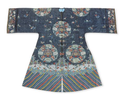 A RARE MIDNIGHT-BLUE-GROUND GAUZE SILK 'LANTERNS' MANCHU WOMAN'S INFORMAL SURCOAT, CHANGPAOMid-19th centuryThe front-opening 