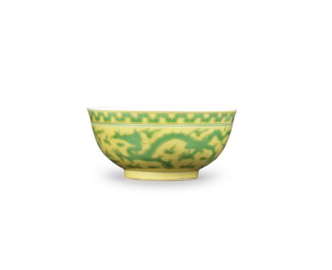 A RARE IMPERIAL YELLOW-GROUND GREEN-ENAMELLED 'DRAGON' BOWLYongzheng six-character mark and of the periodThe bowl with deep r