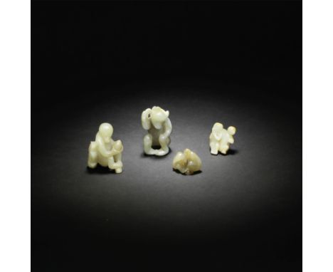 FOUR JADE CARVINGS OF MONKEYS17th/18th centuryThe largest monkey carved seated using a branch issuing a ripe peach to scratch