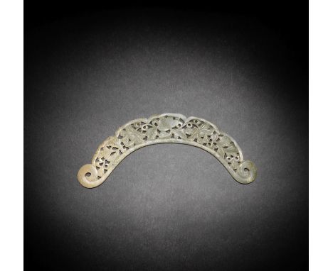 A PALE GREEN JADE RETICULATED CRESCENT-SHAPED ORNAMENTSong DynastyOf flat arch form, delicately carved and pierced with a fol