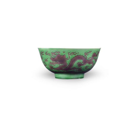 A VERY RARE AUBERGINE-GLAZED GREEN-GROUND 'DRAGON' BOWLKangxi six-character mark and of the periodThe bowl with rounded sides