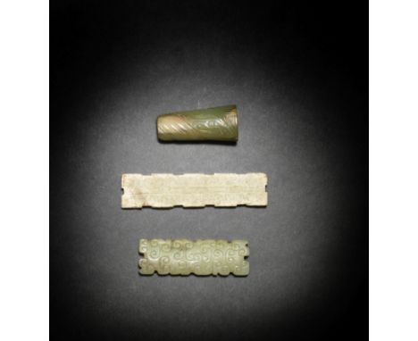 THREE ARCHAIC JADE CARVINGSShang Dynasty/Warring States PeriodComprising a conical bead, Western Zhou dynasty, carved around 