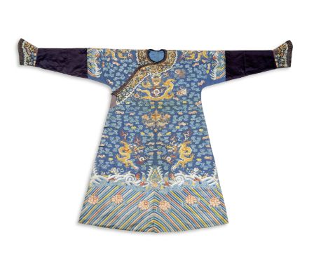 A BLUE-GROUND EMBROIDERED SILK WOMAN'S 'DRAGON' ROBE, JIFU19th century The garment finely embroidered on the front and back i