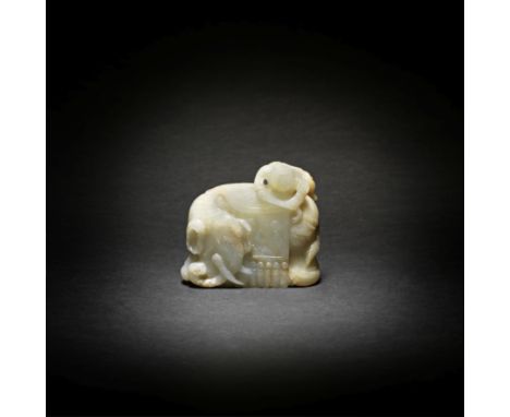 A PALE GREEN AND RUSSET JADE 'ELEPHANT AND BOY' GROUP17th/18th centuryThe charmingly wrinkled elephant with a finely incised 