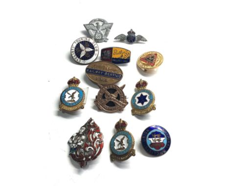 Selection of vintage enamel badges includes nazi badge butlins royal air force railway etc 