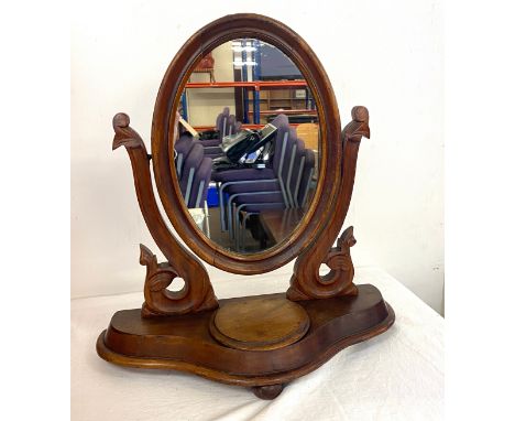 Antique Mahogany swing mirror and a mahogany whatnot stand 