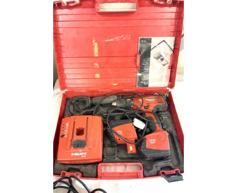 Cased Hilti drill SF151a with batteries and charger, electrical light lamp, angle instrument 