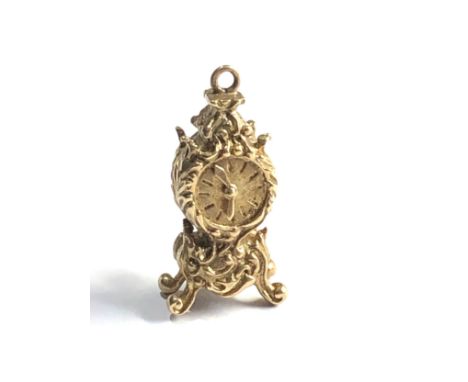 9ct gold articulated clock weight 7.5g 