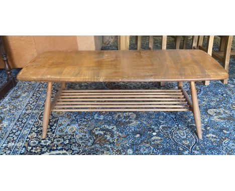 Ercol coffee table measures approx 14" tall 40" wide depth 17" 