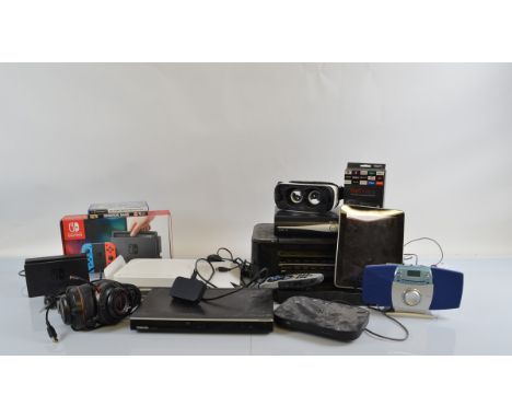 A large collection of assorted electrics, including Nintendo Switch accessories, Apple iPad 32Gb, Sky + HD box, various gamin