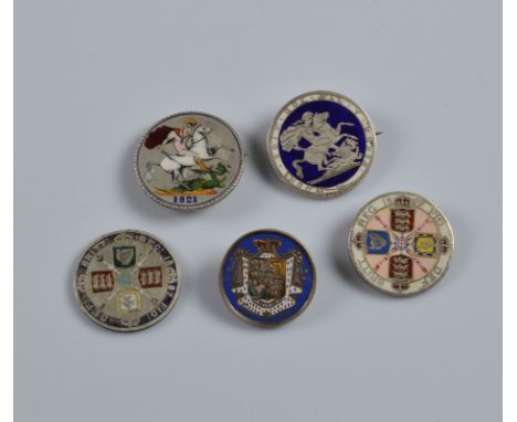Five Georgian and Victorian silver enamel coins, including some with brooch mountings (5)
