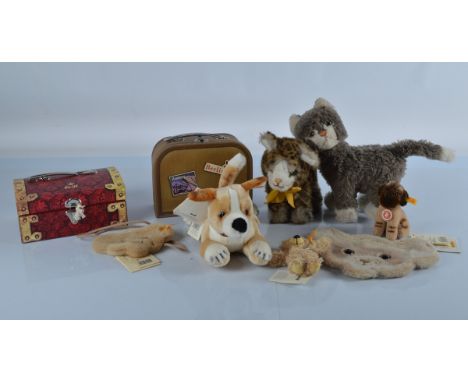 Recent yellow tagged Steiff, a Chihuahua, 10 inch (25.5cm) long, a dated Mops bulldog, two teddy bear head purses, a keyring,