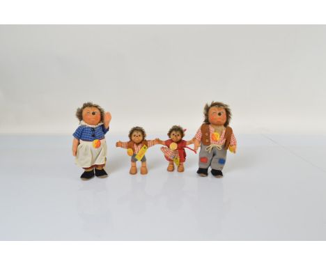 A family of four Steiff hedgehog figurines, comprising Mecki 18cm high, Micki 17cm high, Mucki 11.5cm high and Macki 12cm hig