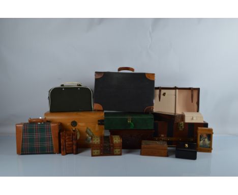 A collection of dolls travel accessories, including trunks, tartan and leather suitcases, decoupage pine trunk and various do