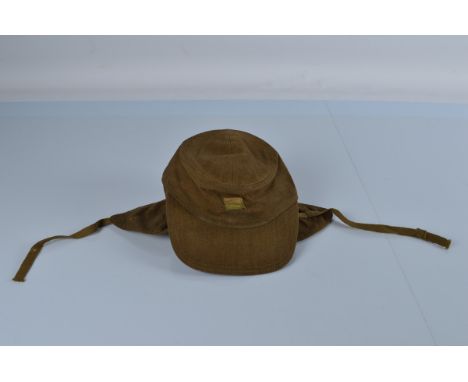 A green War Dept. cap, circa 1936 With Broad arrow mark inside WD 36.