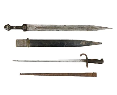 An unusual early 19th Century Oriental Short Sword, with 24" (62cms) decorated steel blade, and shaped bone handle with silve