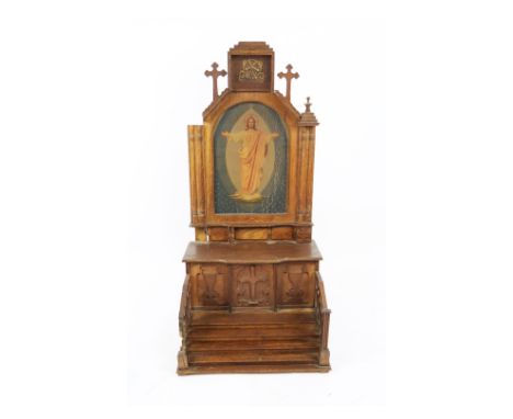 An ornate carved oak Table Alter, with brass Celtic design mount, image of the Sacred Heart with front steps and railings. (1