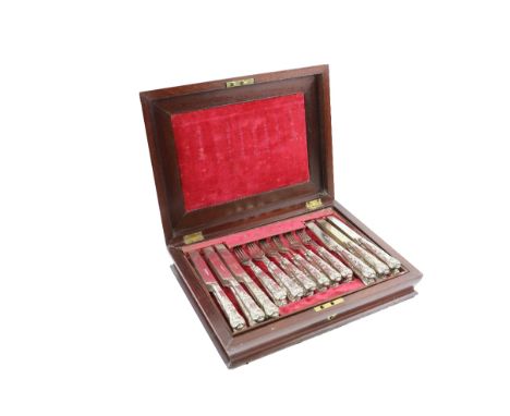 A mahogany cased 36 piece silver Canteen of Kings pattern and crested Cutlery, each with "C" monogram, and family crest (Conn