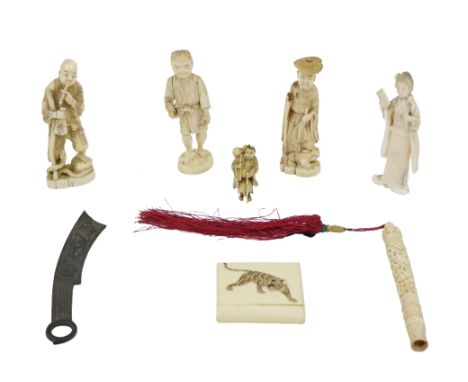 A group of four 19th Century Japanese Okimono Figures,&nbsp;to include "Geisha" Girl, "A Sage," "Snake Charmer," and a "Scrib