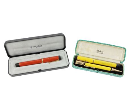 A Duofold Fountain Pen and Pencil, with black and yellow container and gilt mounts,&nbsp; together with another Parker 5-16 P