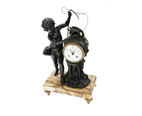 A late 19th Century French Figural Mantle Clock, withy young boy with fishing rod, basket and fish beside a stylized pillar e