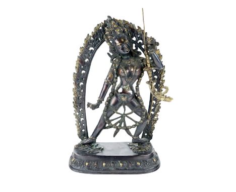 A large 19th Century Vajrayogini Figure of Tibetan Deity Dakini, brass with flame border or Aureole wearing skull crown, and 